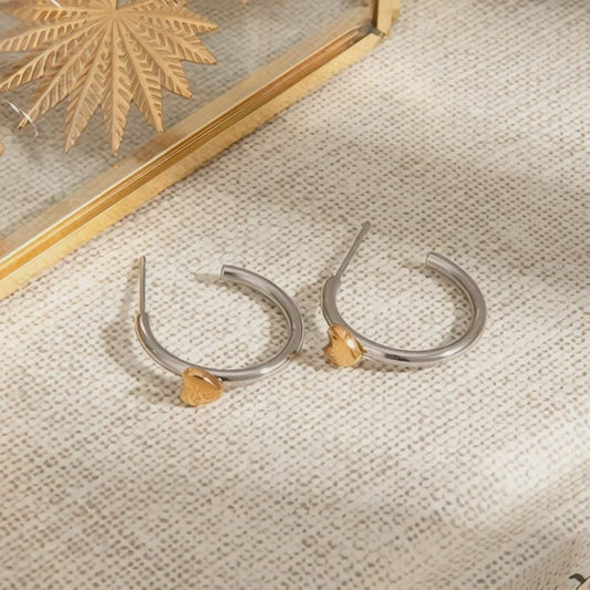 Two tone stainless steel heart hoop earrings design and detail showcase