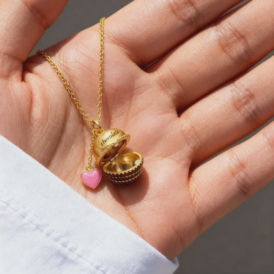 chocolate box opening pendant necklace video showing pearl inside and heart charm detail