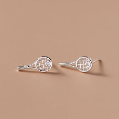 Rotating display of S925 sterling silver tennis racket stud earrings with crystal accent for wholesale jewelry buyers