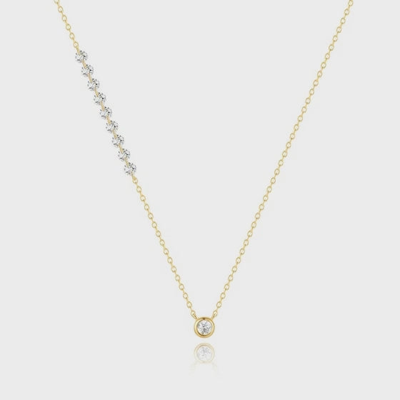 Motion view of sparkling round zircon station necklace sparkle.