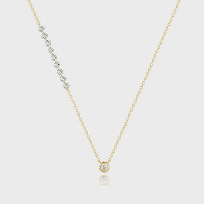 Motion view of sparkling round zircon station necklace sparkle.