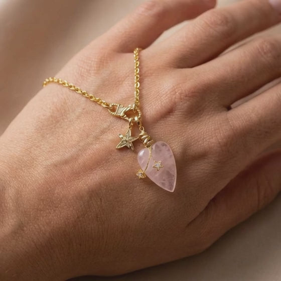 rose quartz heart pendant necklace video showing pink gemstone pendant and star charm details