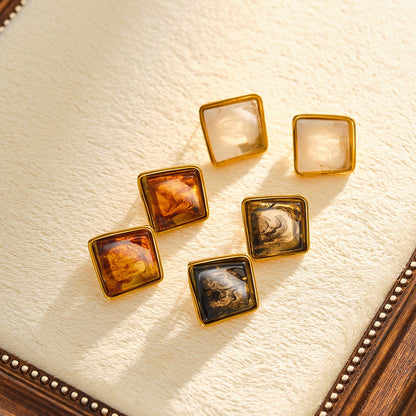Assorted vintage style square resin stud earrings for boutique resale in caramel cream and smoky tones