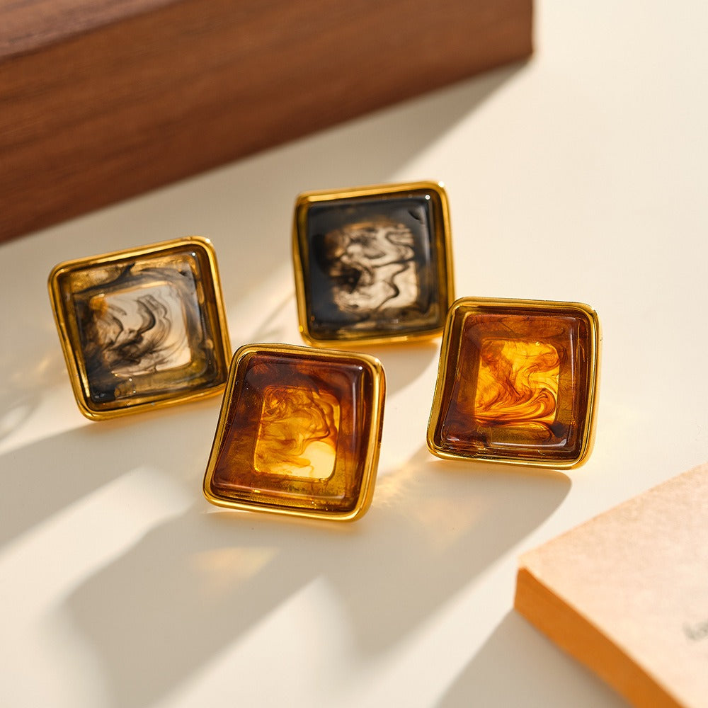 Vintage square resin stud earrings with gold tone frame in caramel and smoky marble finish