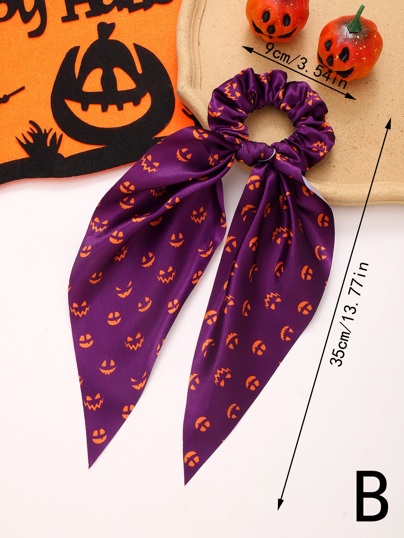 purple hair scrunchy with ribbon