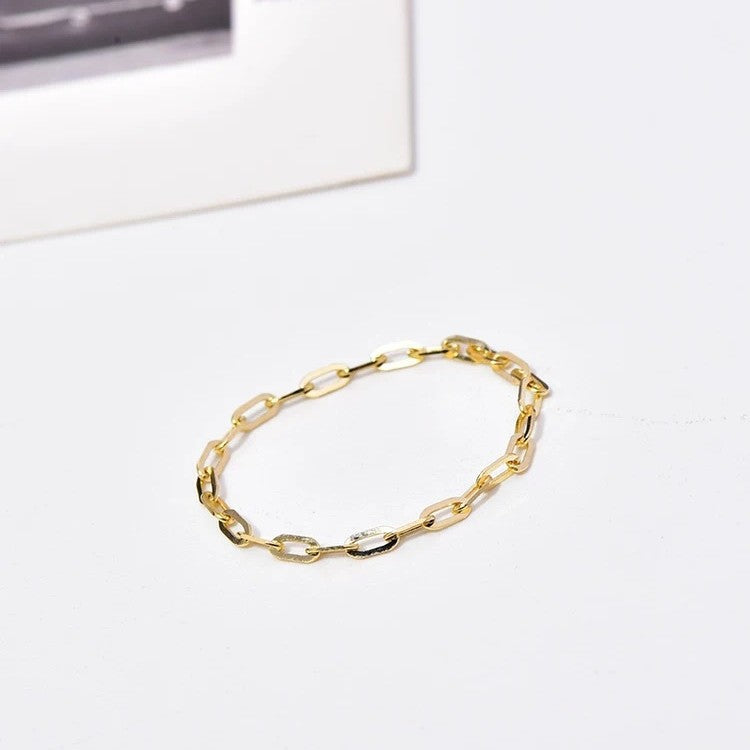 S925 sterling silver gold tone chain ring displayed on white background