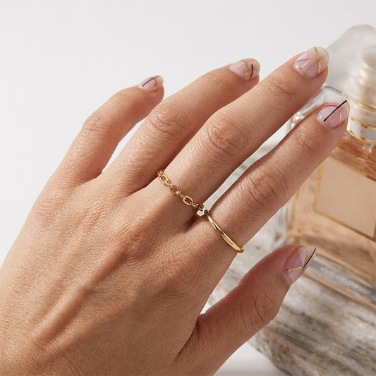 Gold tone S925 sterling silver chain ring styled with minimalist fashion jewelry