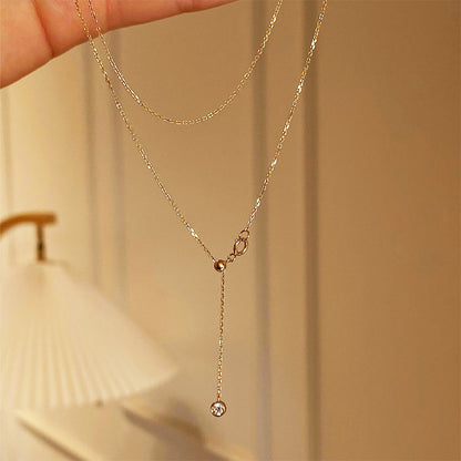 S925 gold Y drop zircon necklace with polished bead detail for boutique resale