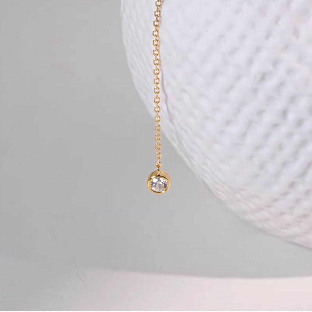 Close up of S925 18K gold plated zircon drop pendant on adjustable Y necklace
