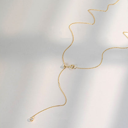 Wholesale S925 18K gold plated Y drop zircon necklace displayed flat with adjustable chain