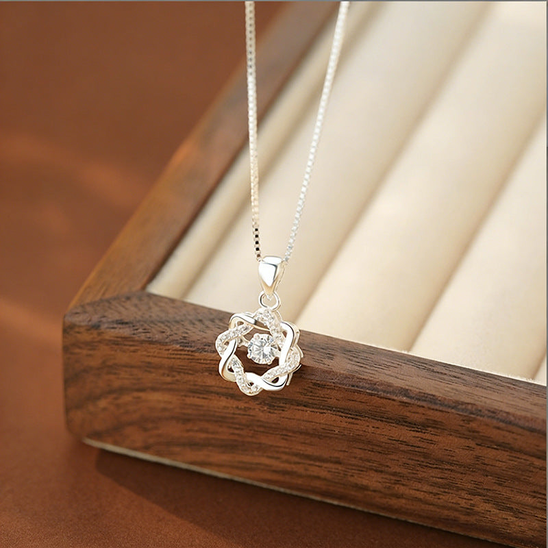 S999 silver eight point star pendant necklace displayed in jewelry box
