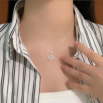 S999 silver star pendant necklace worn with delicate clavicle chain styling