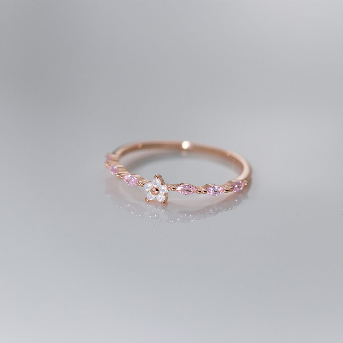 S925 sterling silver Sakura Bloom ring with pink zircon stones and cherry blossom flower design in rose gold finish