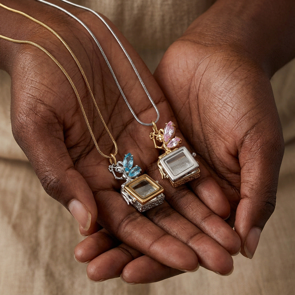 Close up of vintage square box locket pendant necklace with butterfly crystal detail and openable box design