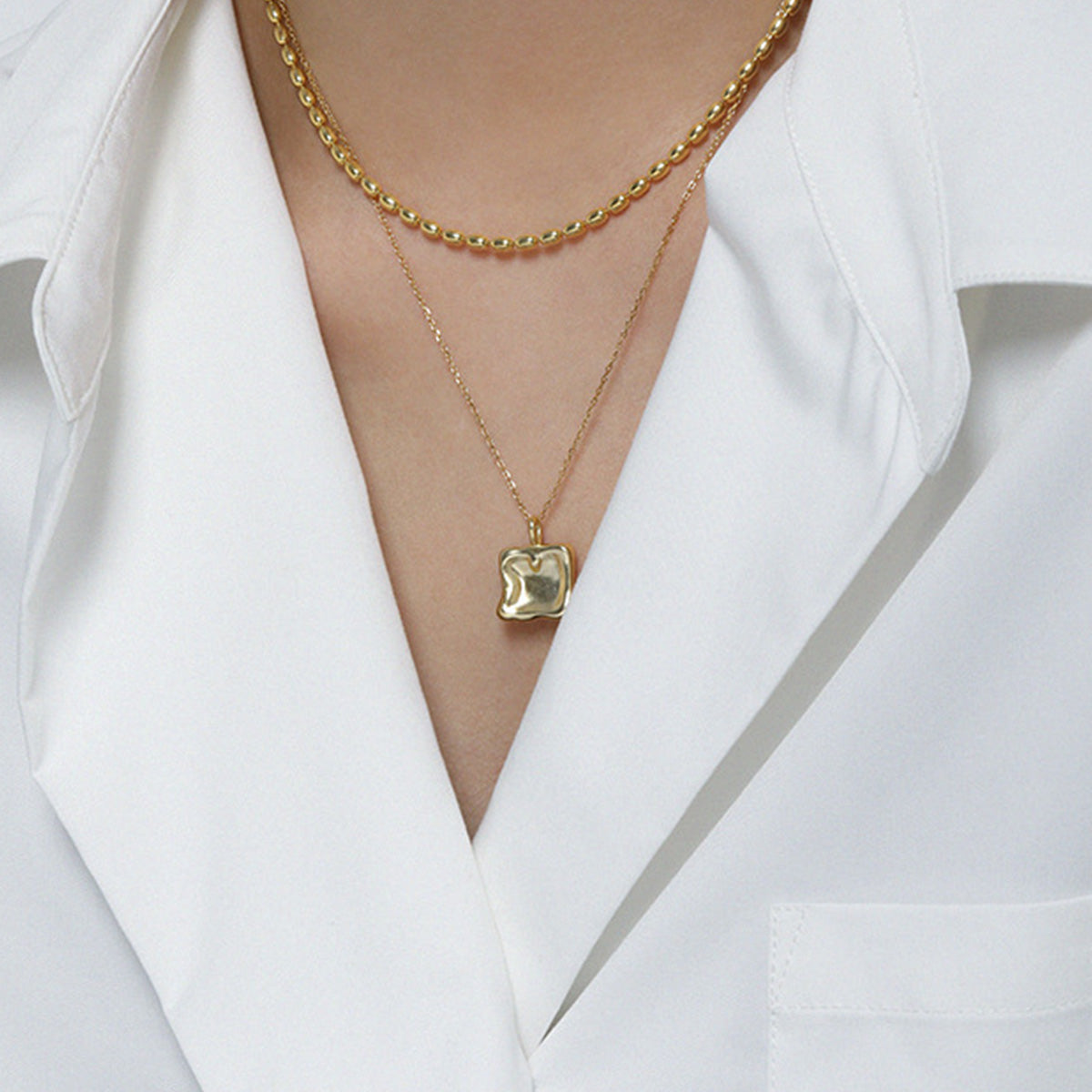 Gold tone geometric pendant necklace for minimalist jewelry wholesale and B2B bulk gift