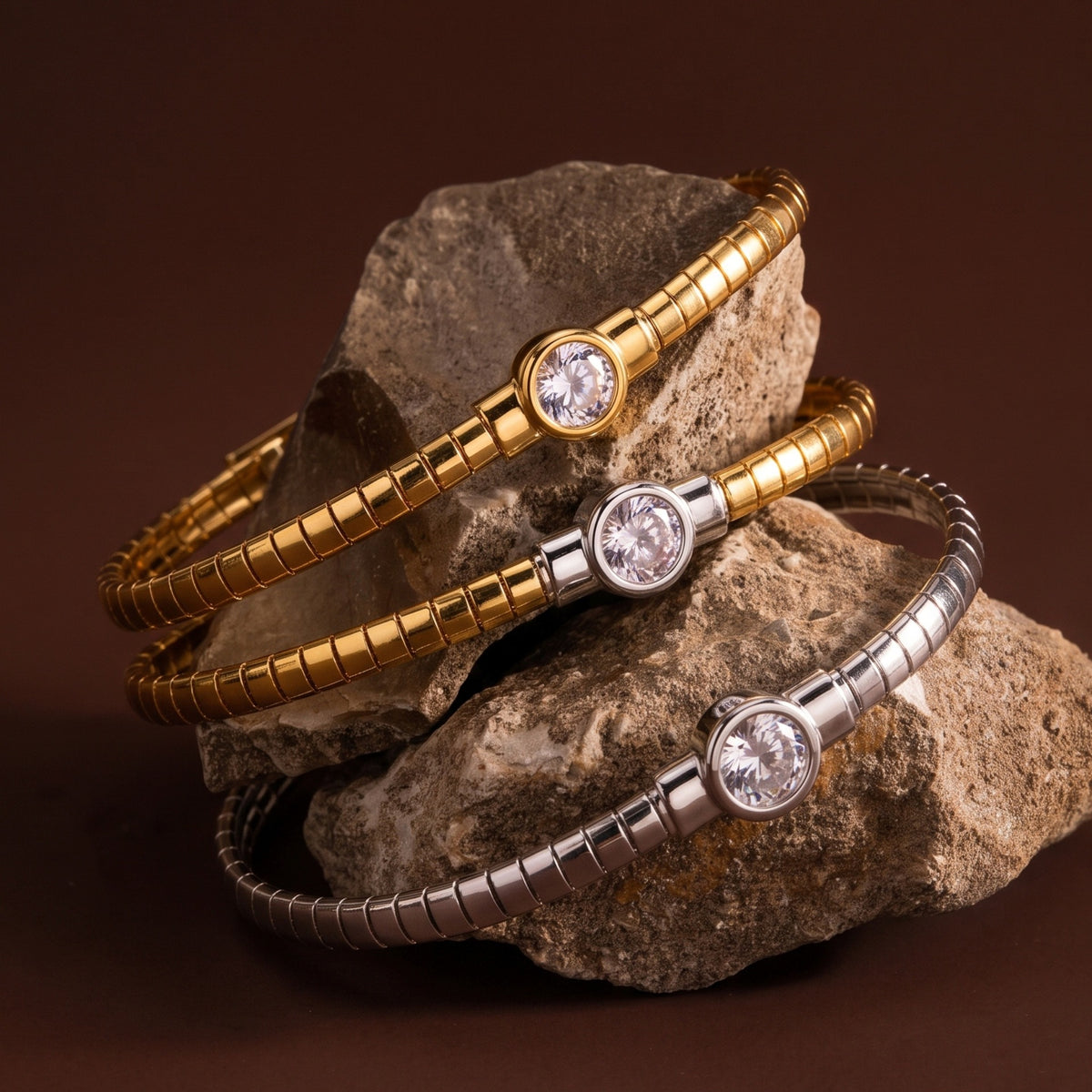 Stainless steel segmented bangle with round cubic zirconia
