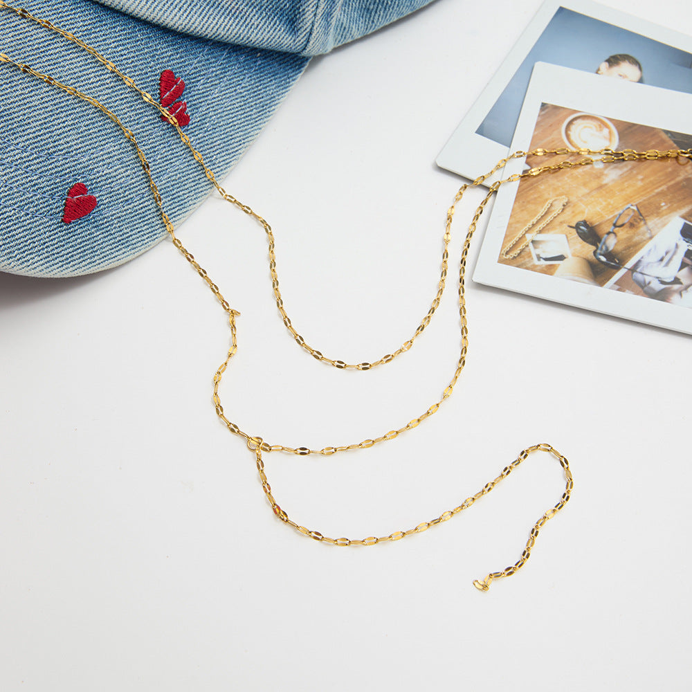 Gold stainless steel Y chain necklace flat lay display