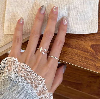 S925 sterling silver star rings styled for wholesale fashion jewelry resale