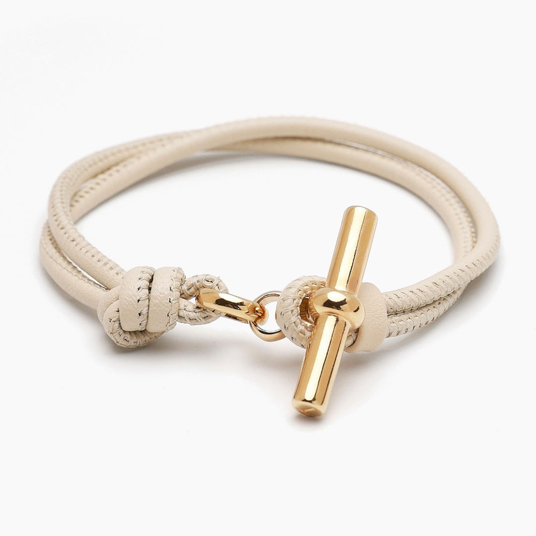 Beige cord T bar bracelet minimal toggle closure gold tone hardware