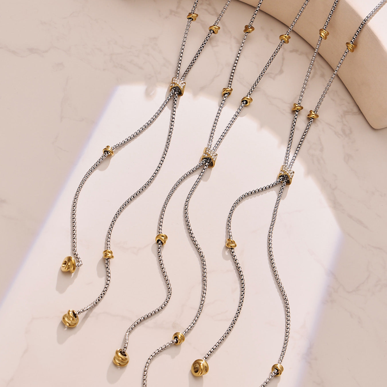 two tone stainless steel tassel y necklace with zircon slider