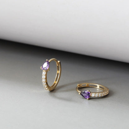 Vintage style huggie hoop earrings with purple teardrop cubic zirconia stones and 18K gold plated finish