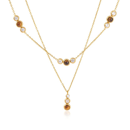 Two separately sold necklaces shown together for styling