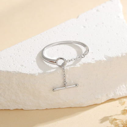 Close up of S925 sterling silver open ring with chain link and T bar charm