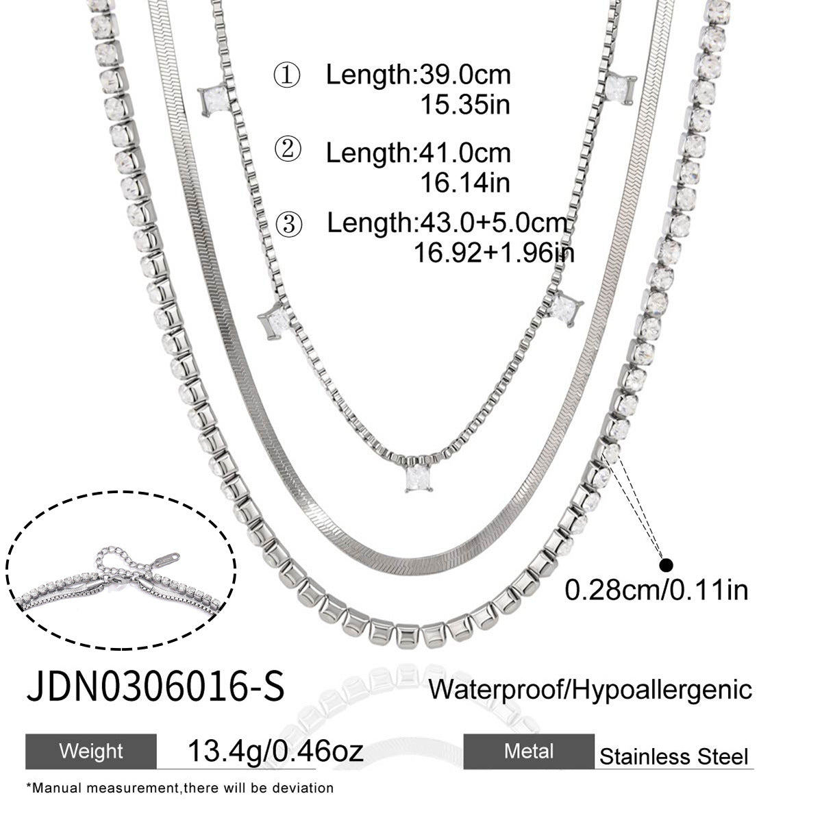 Silver tone triple layer stainless steel necklace with chain lengths and cubic zirconia details
