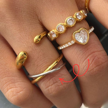 Womens two tone stainless steel ring set in gold and silver worn on hand