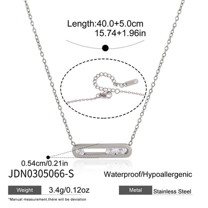 Silver tone stainless steel open bar necklace with moving clear cubic zirconia stones