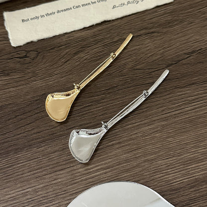 Rear pin fastening on gold and silver ginkgo leaf metal brooches