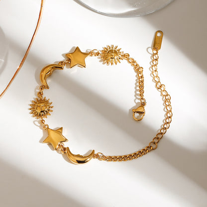 Gold celestial charm bracelet with moon sun star design in stainless steel for wholesale gifts