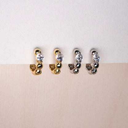 S925 sterling silver huggie earrings in silver and 18K gold plated finishes for wholesale jewelry buyers