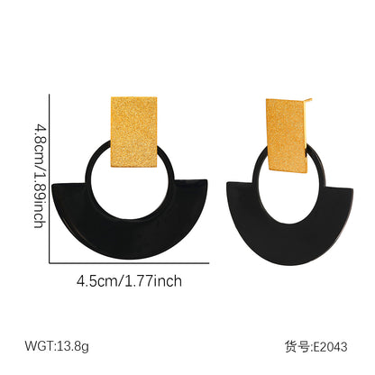 Geometric black and gold tone statement earrings in stainless steel style for wholesale gift shop jewelry