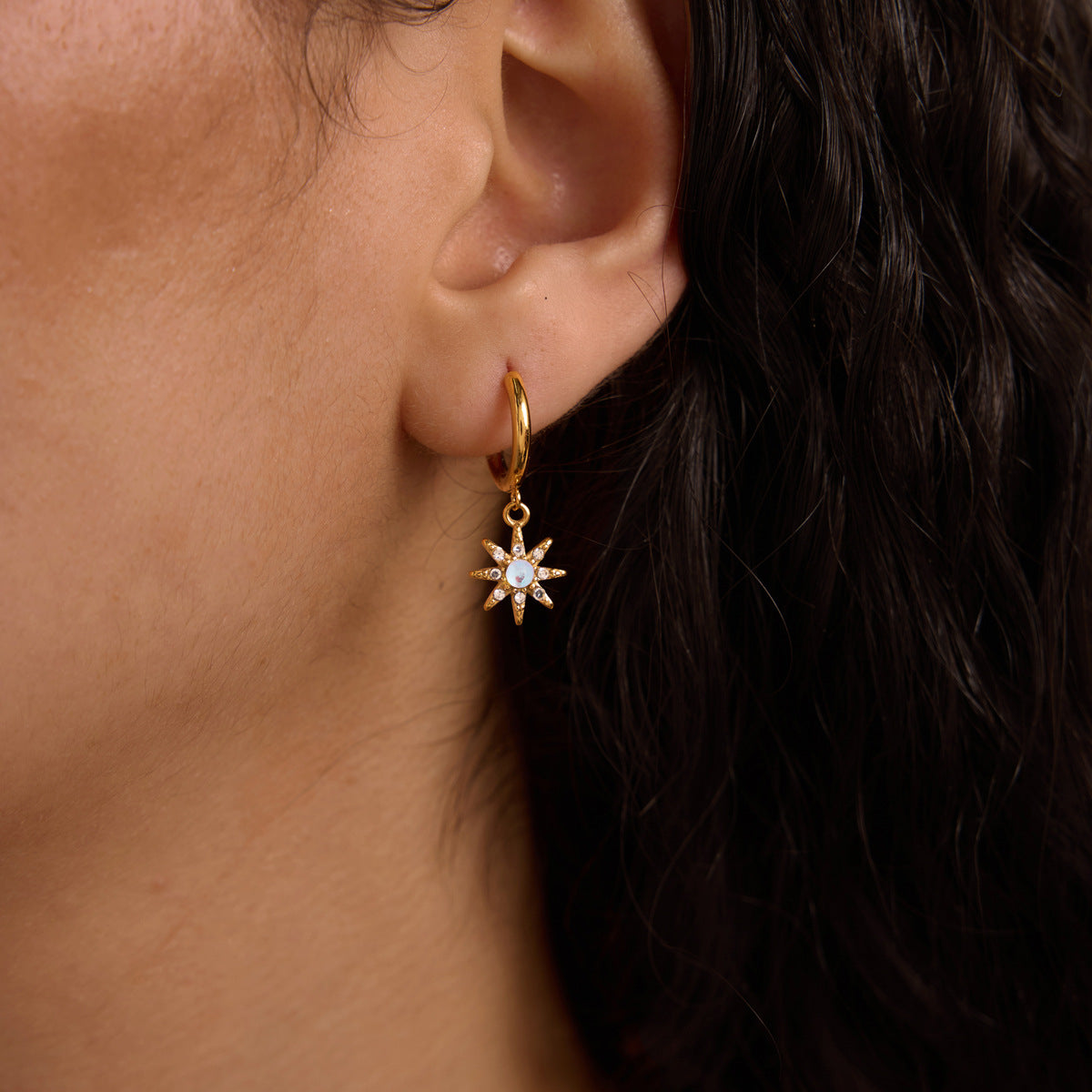 Gold hoop earrings with moonstone moon and zircon star charms