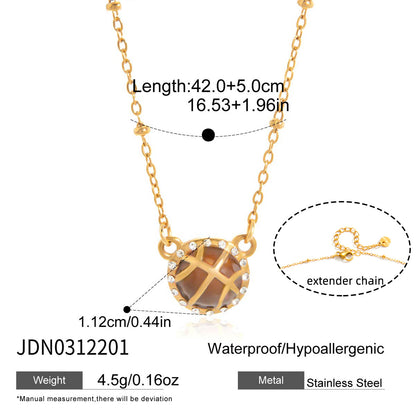 Gold tone stainless steel basketball pendant necklace with enamel and crystal details