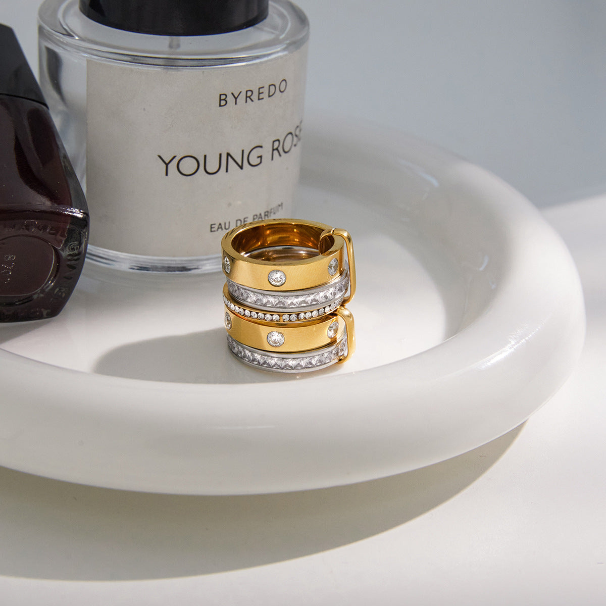 
Wholesale gold and silver stainless steel ring  with zircon accents on white tray