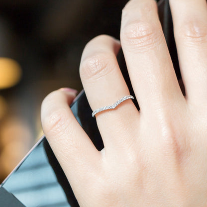 Model wearing slim V shaped zircon ring crafted from 925 sterling silver